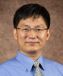Zhengfei Guan